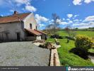 House  DANS UN HAMEAU.