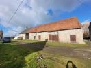 House  DANS UN HAMEAU.